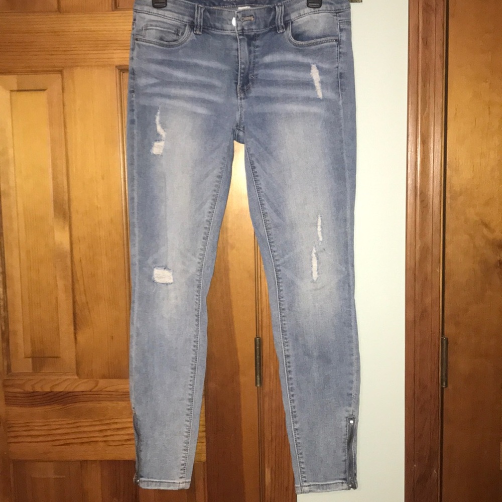 Skinny fit blue jeans size 4.